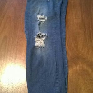 Gently worn distressed skinny leg denim jeans. No